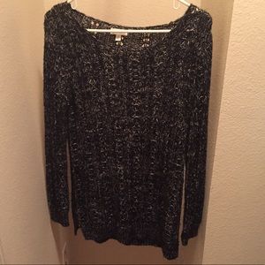 Black sweater with white detailing